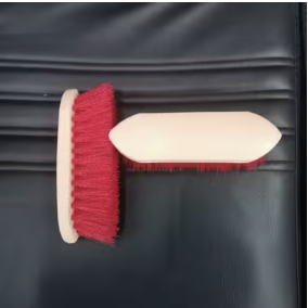 Red bristle grooming brush